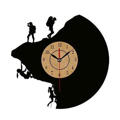 Vinyl clock with multiple climbing silhouettes.