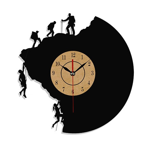 Vinyl record wall clock with climbing silhouettes.